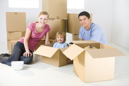 Careful loading of furniture and boxes for an urgent move in Mayfair
