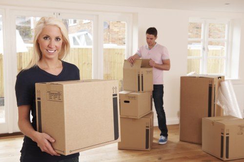 Unpacking boxes and organizing essentials after a move in Mayfair
