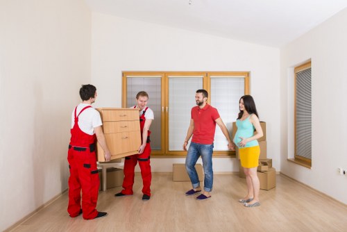 Furniture and boxes being loaded for a Mayfair relocation