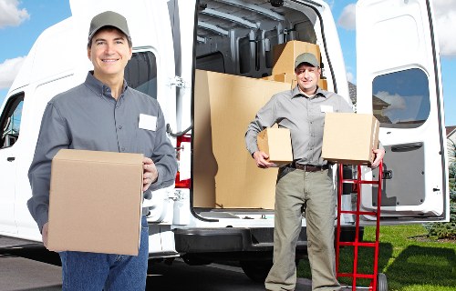 Careful wrapping and loading of household furniture for a Mayfair move